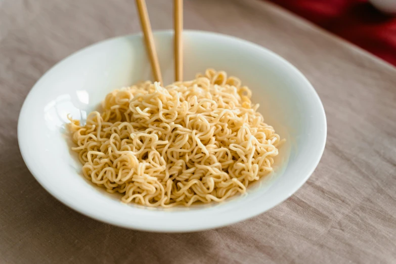 a bowl of noodles with chopsticks in it, extra crisp image, fan favorite, cereal, 4l