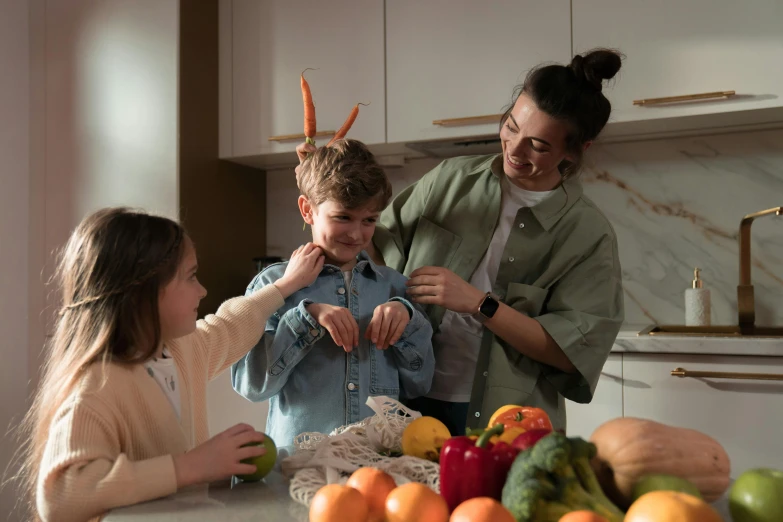 a woman and two children preparing food in a kitchen, pexels contest winner, kids talking to fruit people, avatar image, model posing, profile image