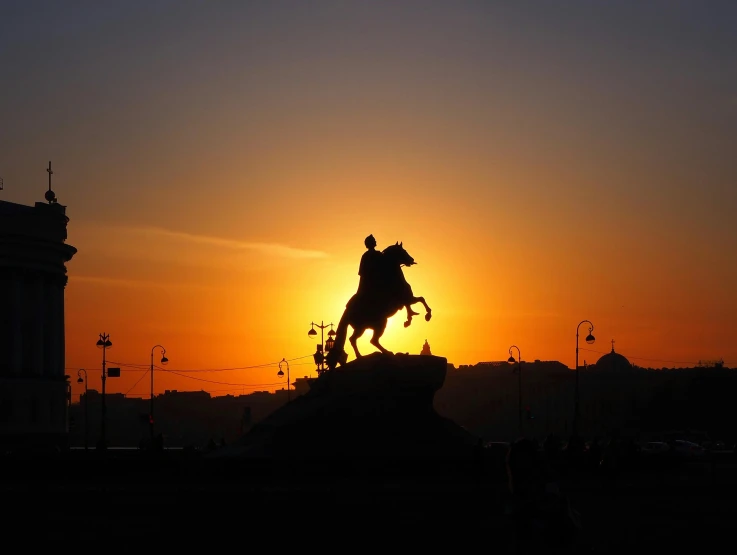 a statue of a man riding a horse at sunset, by Alexander Runciman, pexels contest winner, neoclassicism, saint petersburg, slide show, roma, silhouette :7