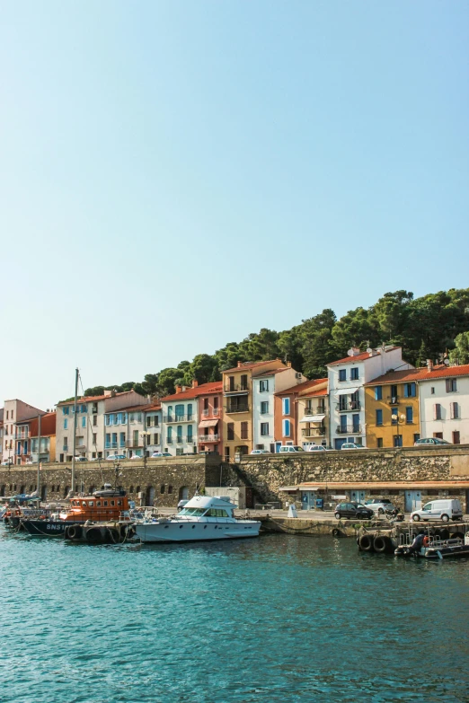 a number of boats in a body of water, a picture, inspired by Wilhelm Marstrand, pexels contest winner, renaissance, french village exterior, pastel hues, square, color photo