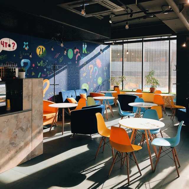 the sun shines in a modern open dining area