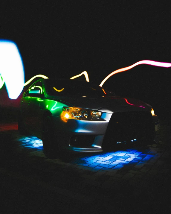 a car is parked next to a light decoration