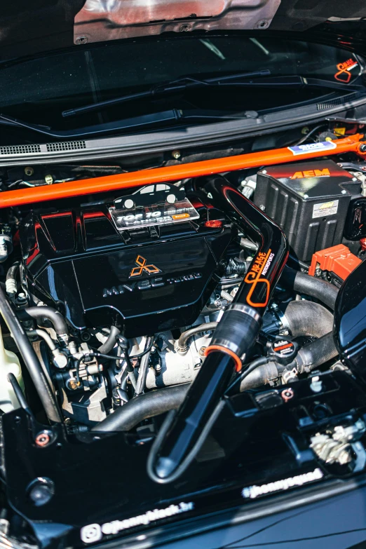 a close up of the engine of a car, by Matt Cavotta, orange details, square, performance, inside of a car