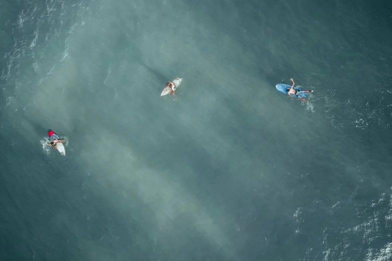 a group of people riding surfboards on top of a body of water, by Daniel Seghers, pexels contest winner, down there, azure ocean, thumbnail, hazy water