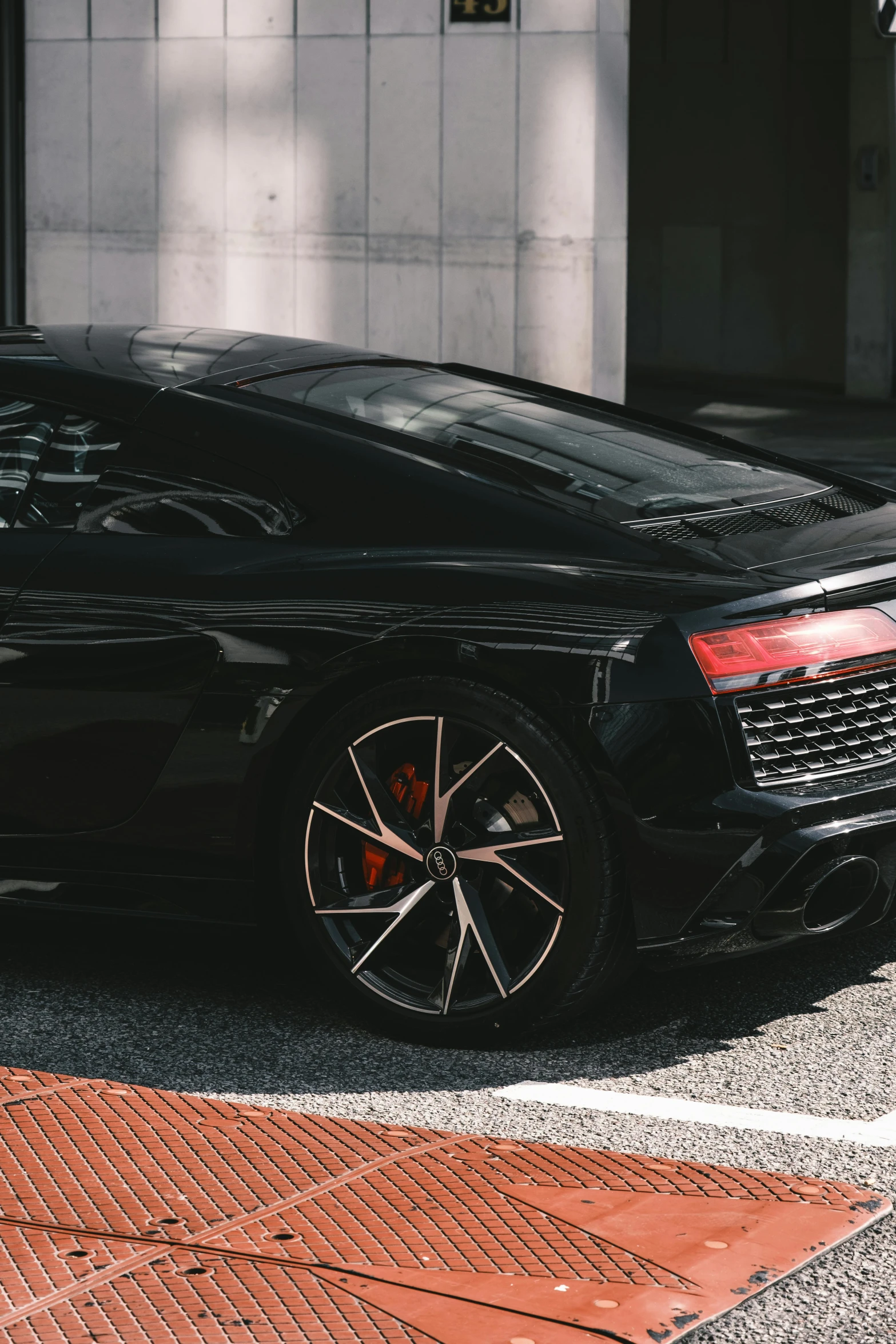 a black sports car parked on the street