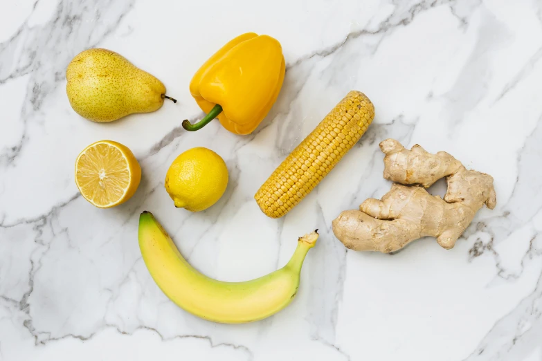 a smiley face made out of fruits and vegetables, pexels, silver and yellow color scheme, wearing yellow croptop, on a canva, smooth marble surfaces