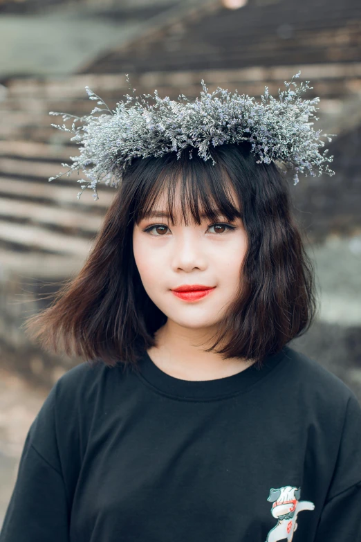 a woman with a flower crown on her head, inspired by Jin Nong, pexels contest winner, fluffy bangs, grey and silver, vietnamese woman, teenager girl