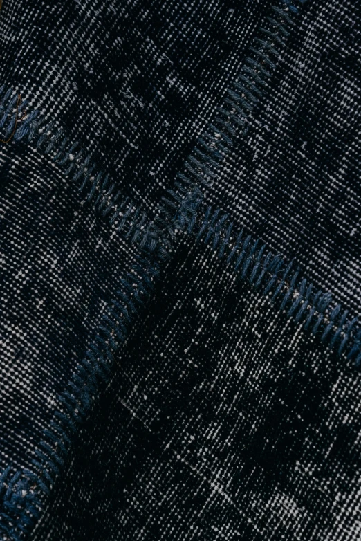 an indigo and white checkered suiting material