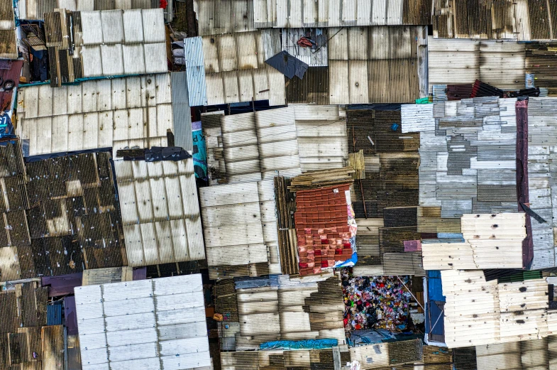 a bunch of boxes stacked on top of each other, an album cover, by Daniel Lieske, trending on unsplash, conceptual art, slums, color aerial photo drone, indonesia, 15081959 21121991 01012000 4k