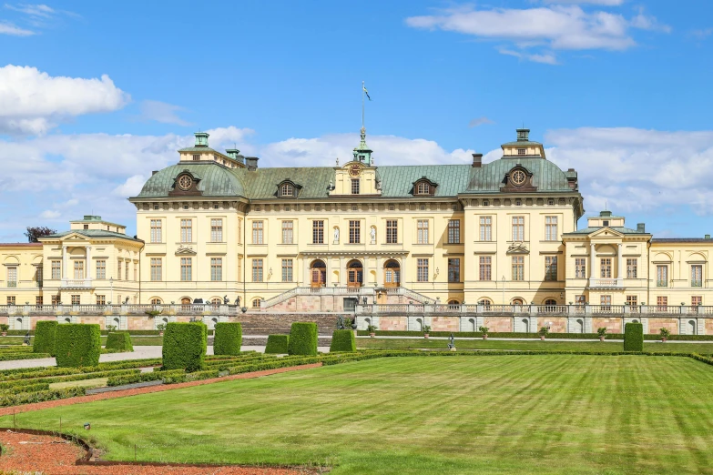 a large building that is in the middle of a field