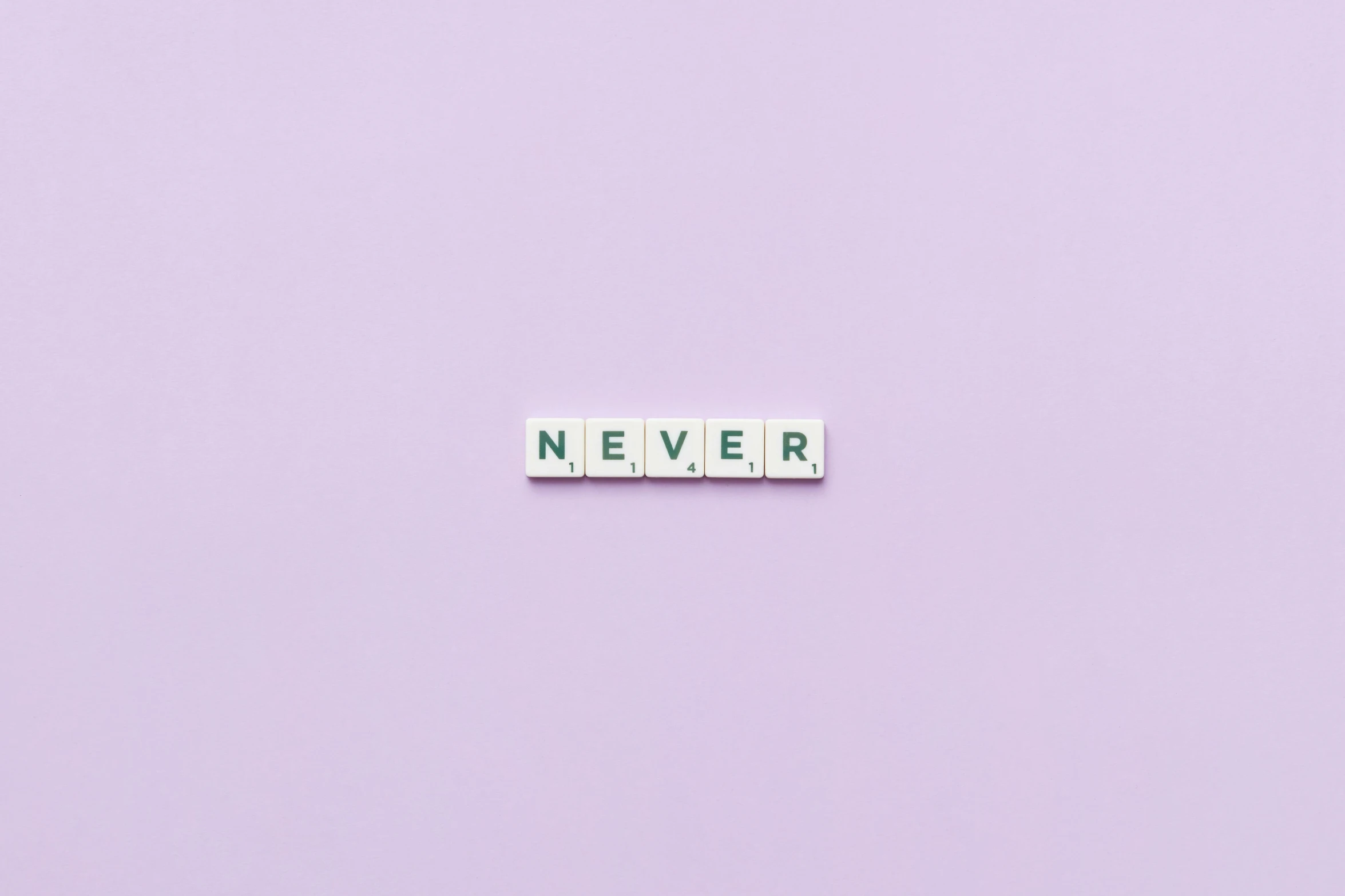 the word never spelled in scrabbles on a purple background, a picture, by Caro Niederer, trending on pexels, pixel art, on a pale background, minimalist photo, taken with canon 5d mk4, van lieven