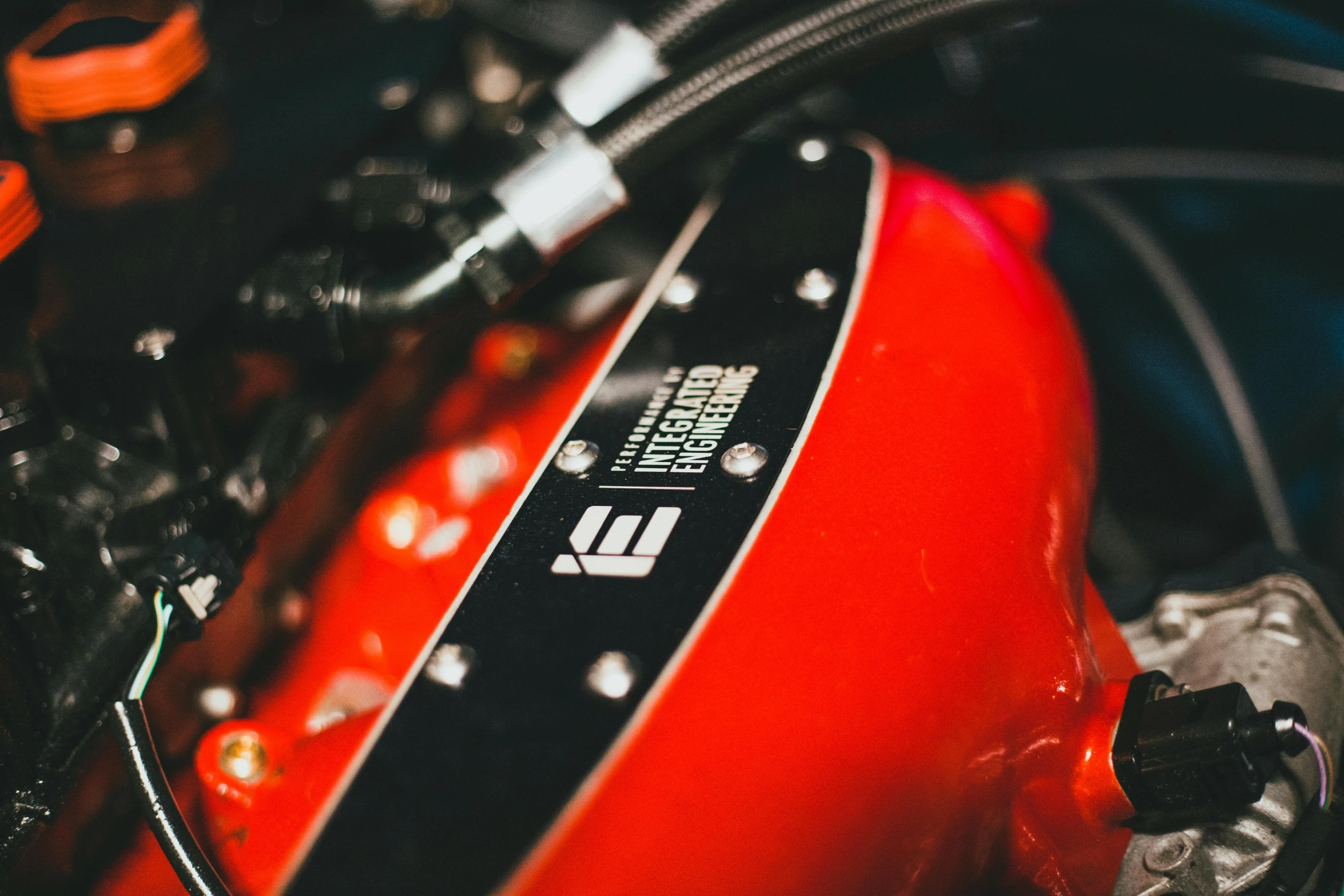 an orange motorcycle is sitting parked on the street