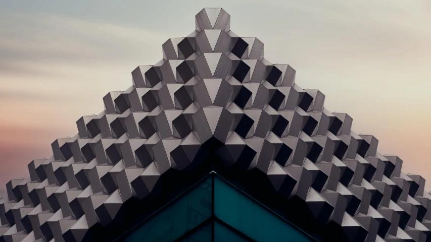 a close up of a building with a sky background, an abstract sculpture, by Matija Jama, pexels contest winner, crown of giant diamonds, fractal ceramic armor, angular minimalism, cellular automata