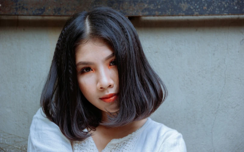 a close up of a person wearing a white shirt, inspired by Itō Shinsui, pexels contest winner, black bob haircut, korean girl, ethnicity : japanese, coral brown hair