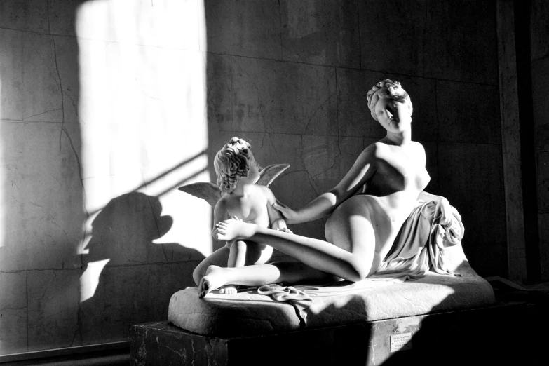 a couple of statues sitting on top of a bed, inspired by Antonio Canova, light shadows, 1997 ), venus, 1940s photography