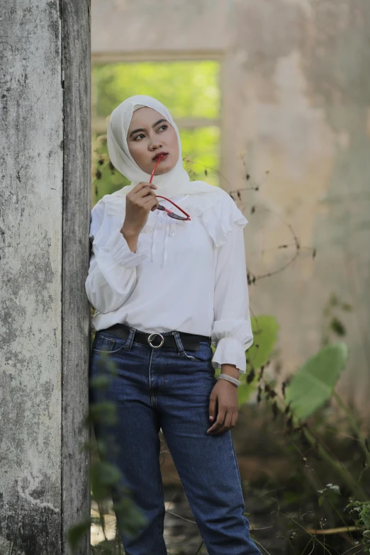 a woman in a white shirt and blue jeans, inspired by Naza, 2019 trending photo, trending on devian art, modeling photography, modest