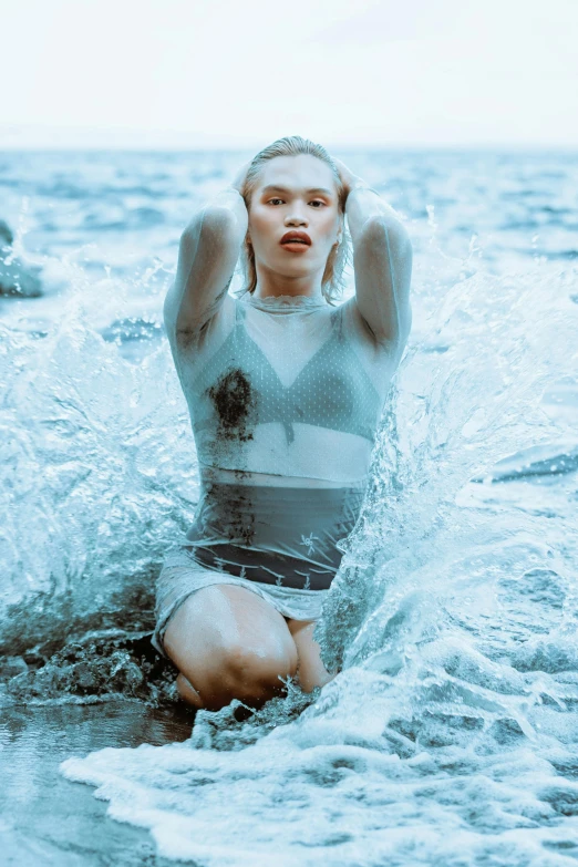 an attractive woman in a wet suit on the water