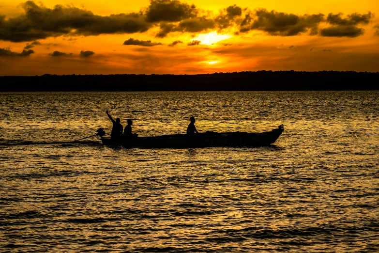 a couple of people that are in a boat in the water, by Joseph Severn, pexels contest winner, sunsetting color, unmistakably kenyan, fishing, on the sea