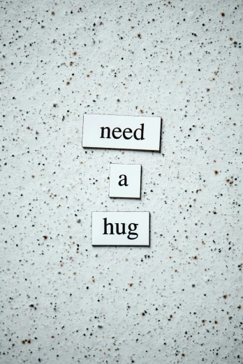 a piece of paper with the words need a hug on it, a picture, by Niko Henrichon, on a pale background, magnetic, u