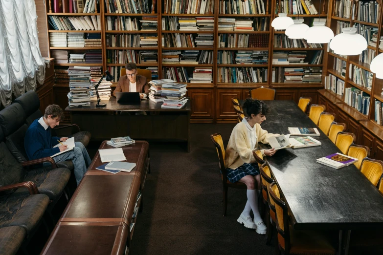 a couple of people sitting at a table in a library, trending on unsplash, paris school, rebecca sugar, ignant, sprawling, government archive