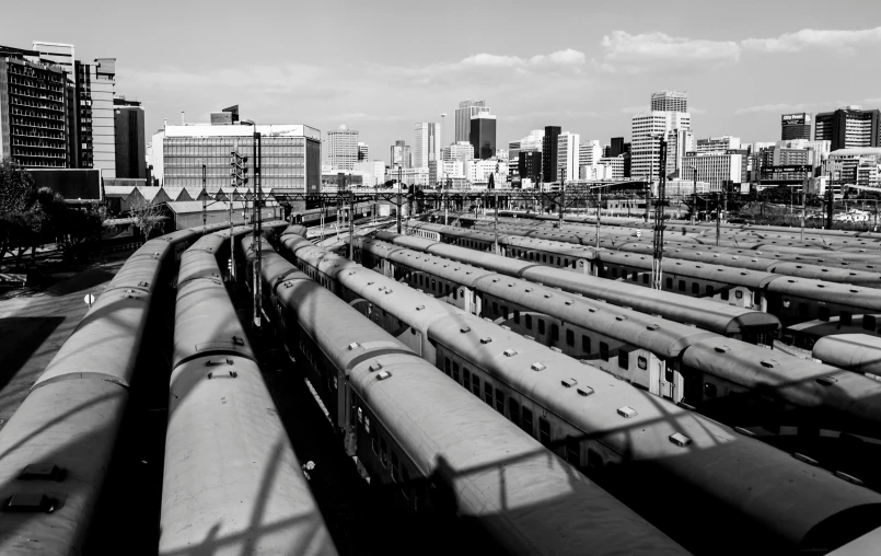 a black and white photo of a train yard, pexels contest winner, toronto city, on a sunny day, today\'s featured photograph 4k, instagram photo