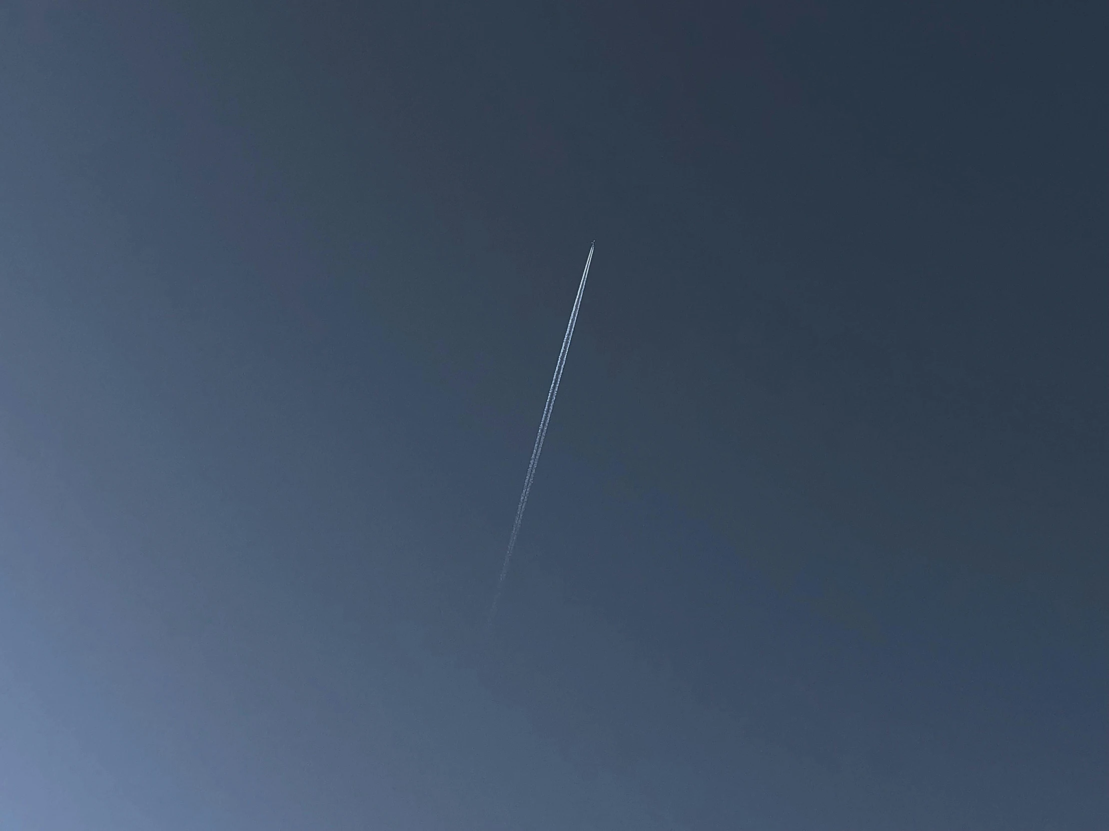 a plane that is flying in the sky, by Niko Henrichon, postminimalism, meteor, very sparse detail, low quality photo, thin lines