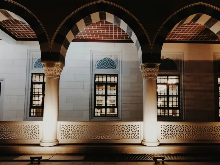 a tall building with arches on it's sides