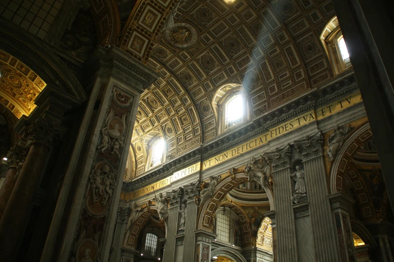 a group of people that are inside of a building, by Cagnaccio di San Pietro, pexels contest winner, light above palace, john paul ii, promo image, interior of a small