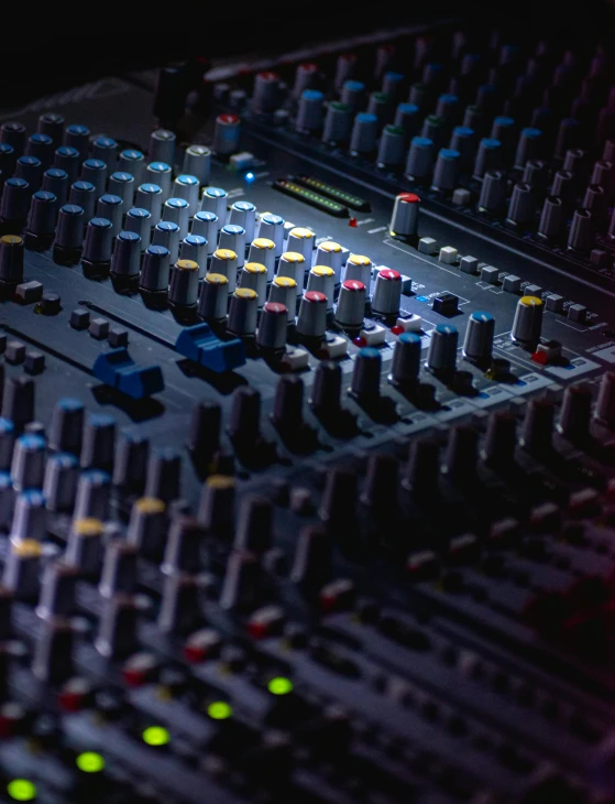 a close up of a mixing board in a recording studio, by Dan Luvisi, trending on pexels, renaissance, thumbnail, multiple stories, blue and red lights, portrait of computer & circuits