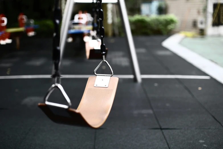 a childs swings in a small yard