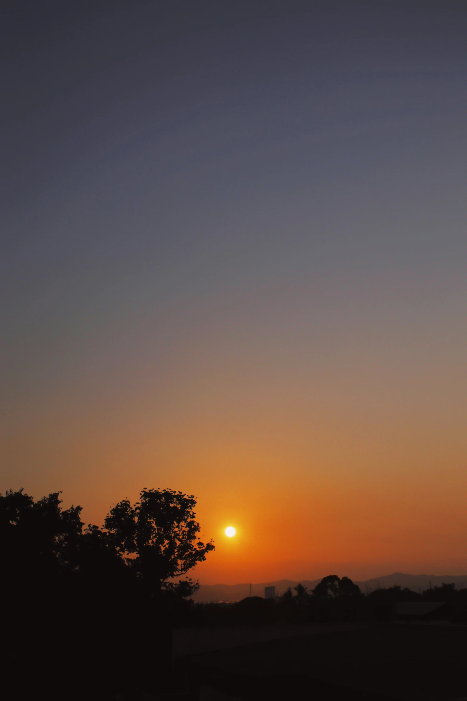 the sun is setting over a field with trees, by Alexis Grimou, romanticism, clear sky, ((sunset)), during an eclipse, mount