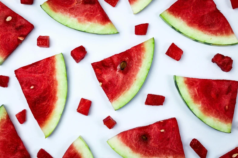 slices of watermelon on a white surface, by Julia Pishtar, gummy bear, vibrant red, highly upvoted, squares