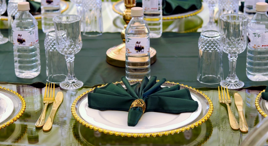 the table is set for a formal dinner