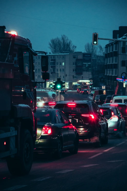 a line of cars waiting for a light to change