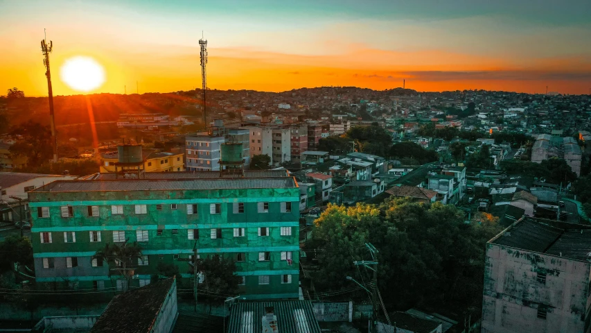 an aerial view of a city at sunset, by Elsa Bleda, pexels contest winner, madagascar, profile image, hdr colors, stacked image