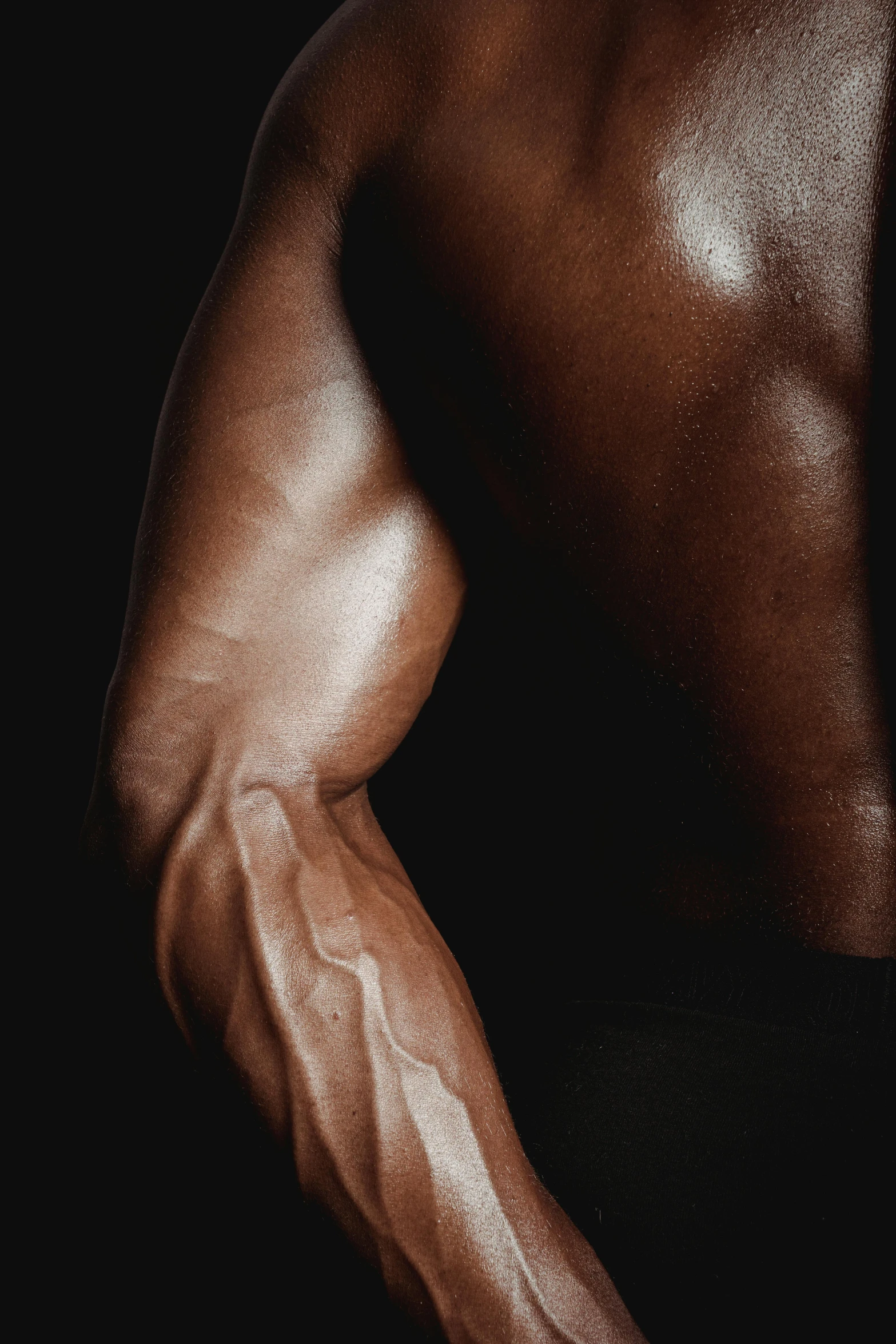 a close up s of the arms and arms of a man