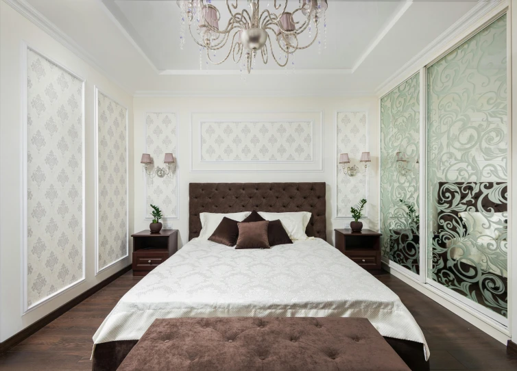 a fancyly decorated bedroom with the bed facing away