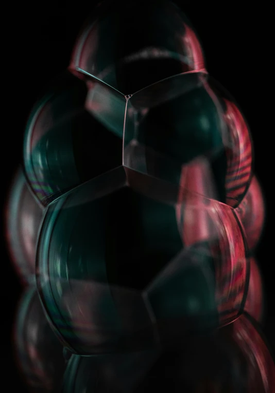 a close up of a soccer ball on a table, a raytraced image, by Adam Marczyński, crystal cubism, bottle, cinematic shot ar 9:16 -n 6 -g, abstract liquid, close up portrait shot
