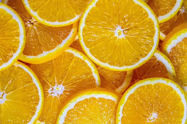 a pile of sliced oranges sitting on top of each other, by Carey Morris, pexels, 🦩🪐🐞👩🏻🦳, yellow-orange, detailed acrylic, thumbnail