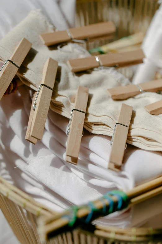 many pieces of wood are placed in a woven basket