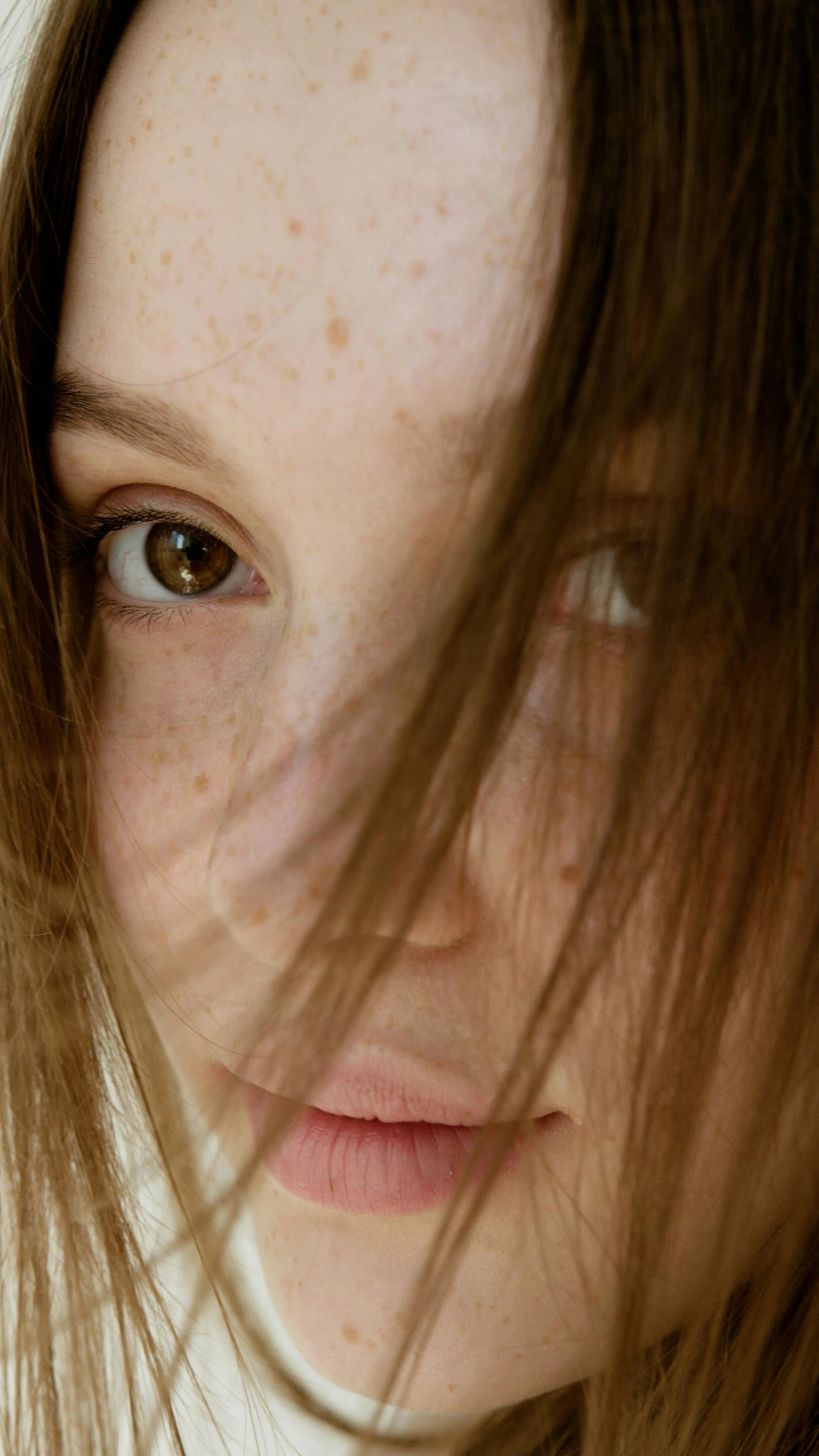 a close up of a person with long hair, trending on pexels, hyperrealism, freckled pale skin, teenage girl, perfect face ), low - angle shot