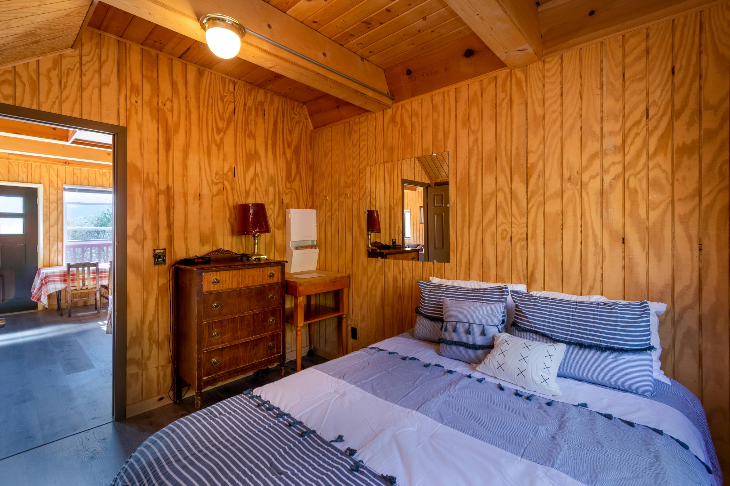 this is an image of a wooden cabin bedroom
