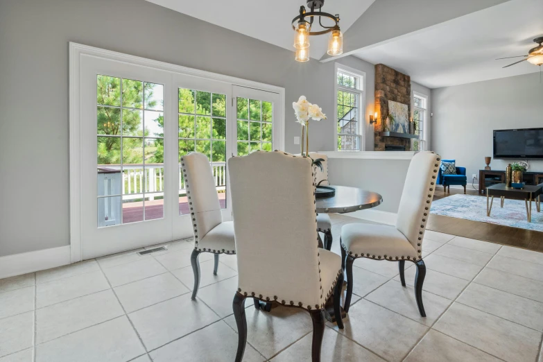 dining room with tiled flooring and windows