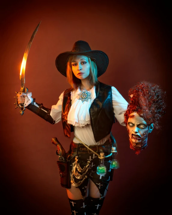 a woman dressed up as a witch with a knife and skull on her arm