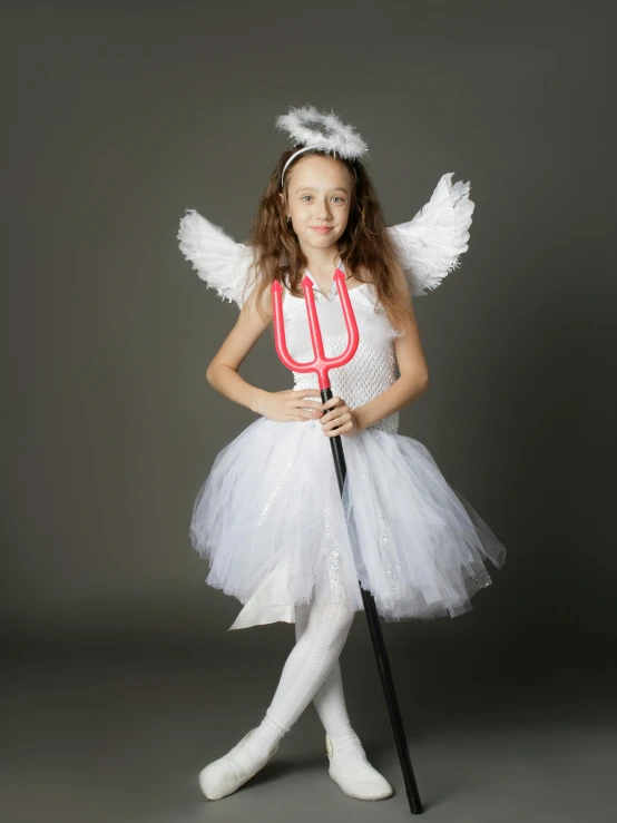 a little girl dressed as an angel holding a pitchfork, inspired by Master of the Legend of Saint Lucy, shutterstock contest winner, modern stylish glamour tutu, on a gray background, фото девушка курит, devils