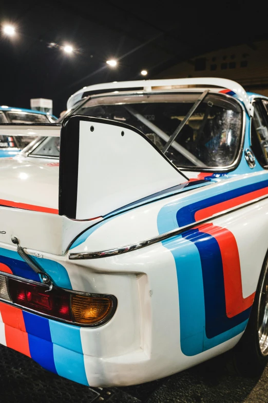 a group of cars parked next to each other, inspired by Harry Haenigsen, unsplash, hypermodernism, 1 9 7 0 s car window closeup, on display in a museum, rally car, 🚿🗝📝