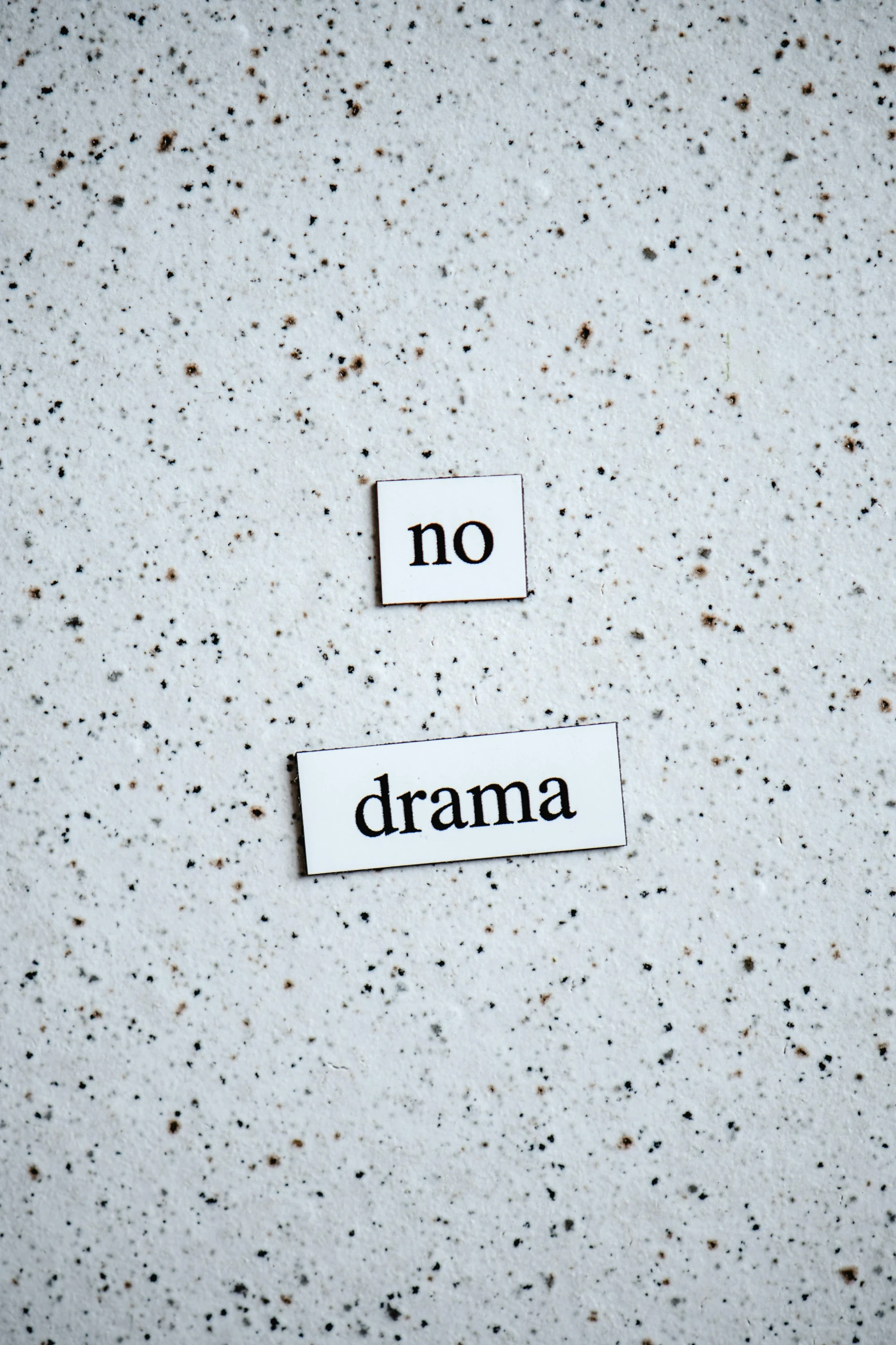 a piece of paper with the words no drama written on it, by Helen Thomas Dranga, trending on pexels, ceramic, concrete poetry, theatrical, two