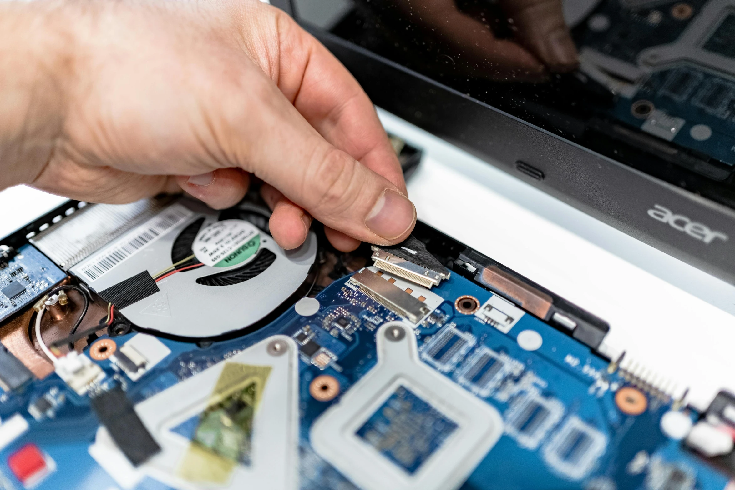 a close up of a person working on a laptop, broken parts, thumbnail, detailed product image, fan favorite
