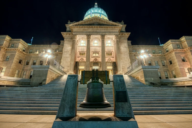 a bell in front of a large building at night, by Greg Rutkowski, pexels contest winner, baroque, square, iowa, capitol hill, panoramic