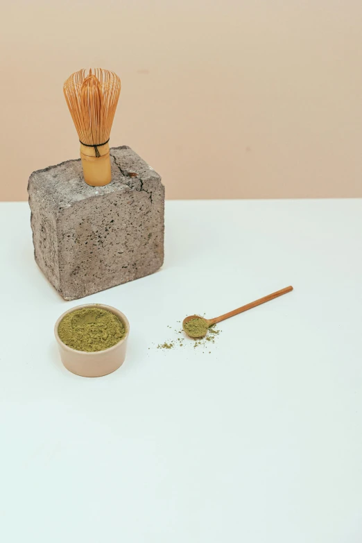 a bowl of matcha next to a cup of matcha, inspired by Inshō Dōmoto, renaissance, large brush, studio product shot, hay, ilustration